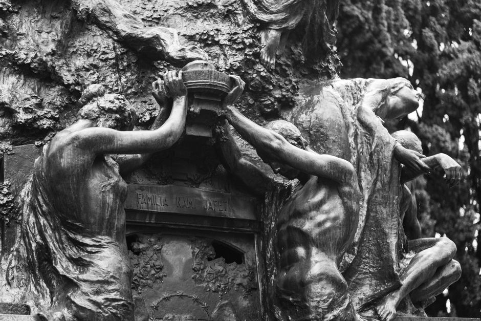 Intricate black and white sculpture detail from São Paulo cemetery.